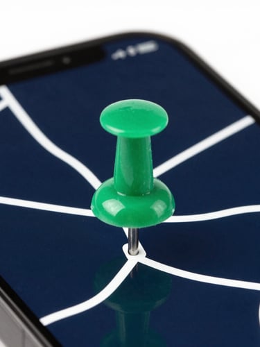 Macro photograph of a smartphone screen displaying a bright emerald green map pin on a deep navy geographic grid, crisp studio lighting, high contrast