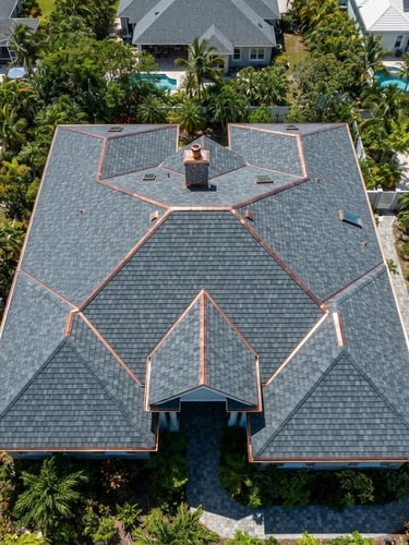 High-altitude drone shot of a completed residential roof in New Providence, sharp architectural shingles, bright midday sun, rich slate gray tones, 35mm