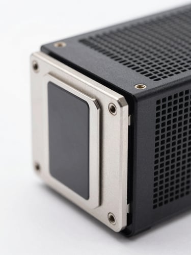Macro close-up of high-end server hardware with sharp metallic edges, crisp shadows, pure white backdrop, bright studio lighting