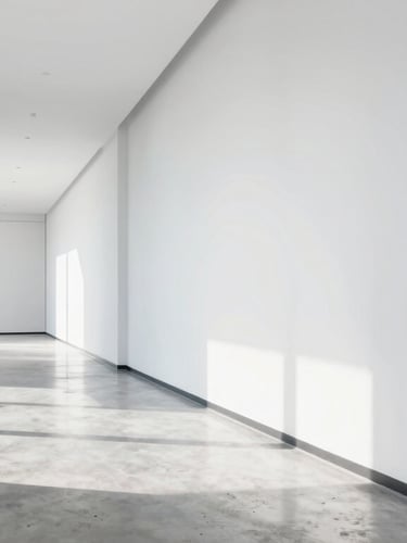 A beautifully lit, minimalist modern office corridor with polished concrete floors reflecting bright daylight, clean and serene, 35mm