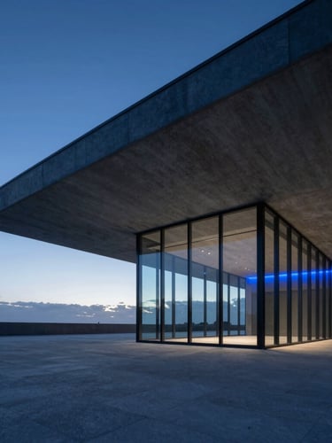Wide-angle architectural photography of a sleek, modern concrete and glass pavilion in St George at twilight, cool blue-hour lighting, sharp geometric lines, horizon blue accent glow.