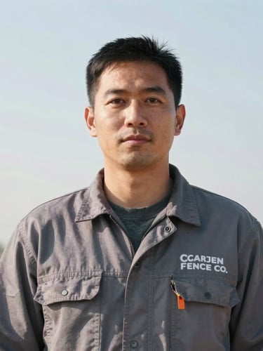 Portrait shot of a Carjen Fence Co. crew member in work attire, looking directly at the camera, confident and professional, bright morning daylight, clean background, 35mm lens.