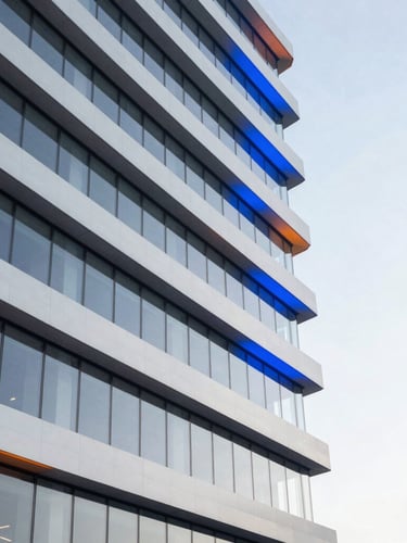 Architectural lines of a modern tech office building, high-key light with sharp electric blue gel accents, 35mm lens.
