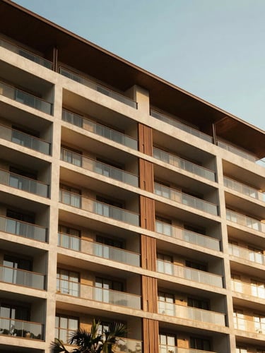 Sun-drenched modern Cebuano condominium facade, sharp architectural lines, bright morning light, 35mm photography
