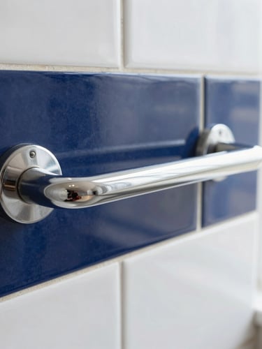 A close-up shot of a sleek, modern chrome grab bar mounted securely onto clean navy blue subway tile, bright natural lighting, sharp focus on the metallic texture.