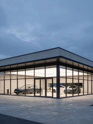 Sleek architectural shot of a modern car rental office in Ljubljana, clean glass facade, deep blue twilight sky, minimalist concrete pavement, 35mm lens