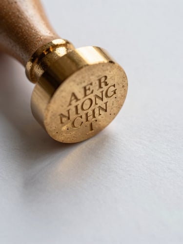 Macro close-up of a gold embossed notary seal on a legal document, soft natural light reflecting off the metallic textured paper.