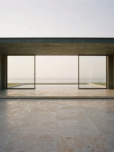 Wide panoramic architectural shot of a minimalist concrete and glass pavilion, soft diffused natural daylight, travertine floors, expansive negative space, 35mm