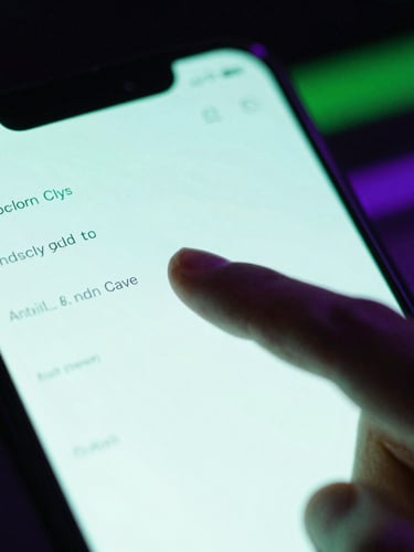 Extreme close-up macro shot of a finger tapping a glowing Android screen displaying a minimalist terminal interface, intense neon green ambient light, dark cyberpunk developer setup, 35mm