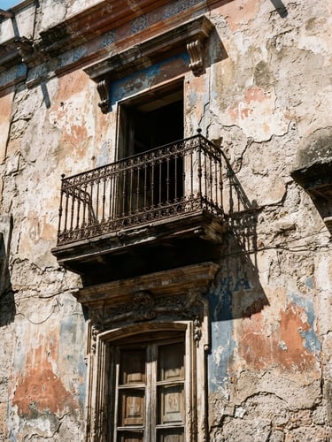 Dramatic architectural detail of a decaying Spanish facade with high-contrast shadows, stark sunlight, 35mm film look