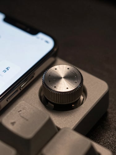 Macro photograph of a mechanical keyboard dial next to a smartphone displaying minimalist terminal-style widgets, low-key dramatic lighting, sharp shadows