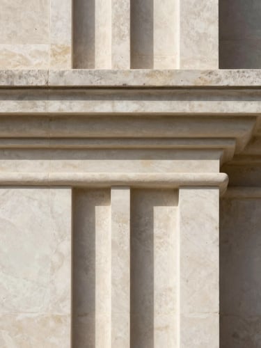 Abstract architectural detail of light limestone showing elegant shadows, clean lines, minimalist composition.