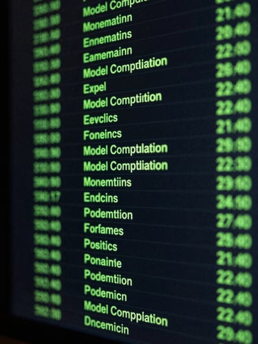 Macro crop of a terminal window displaying model compilation logs, neon green text on dark background, high-contrast digital darkroom lighting.