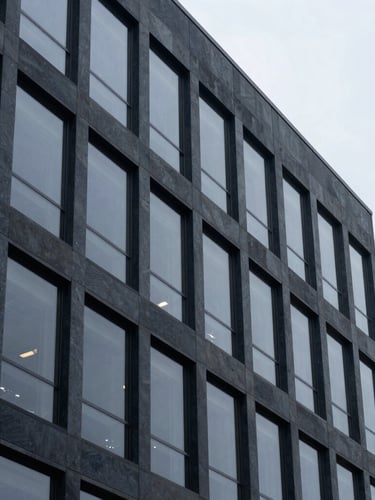 Architectural detail of a modern corporate office facade in South Jordan, Utah, overcast daylight, sharp focus, 35mm