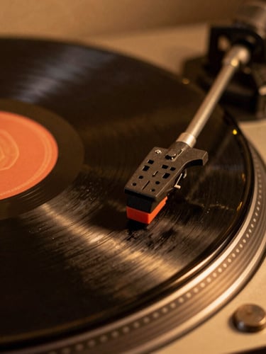 Macro shot of a vintage turntable needle resting on a vinyl record, warm amber studio lighting, rich dark tones, 35mm photography