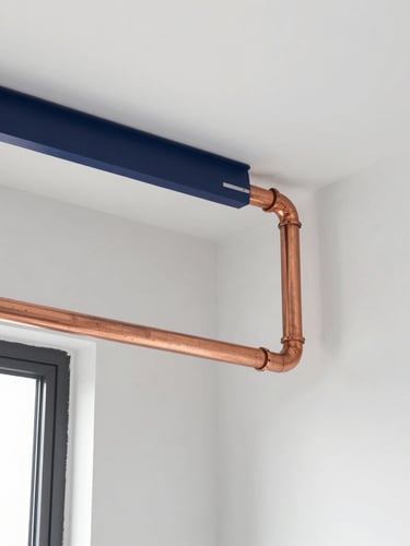 Neat copper pipe installation in a bright utility room, clean lines, professional craftsmanship, daylight