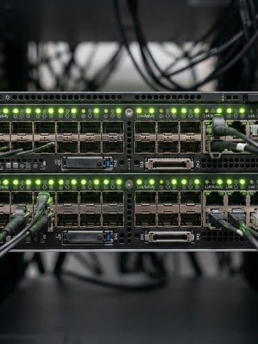 crisp technical product photography, straight-on macro shot of a server rack interface with blinking green lights, bright even studio light, clean minimalist composition, sharp focus, 50mm lens