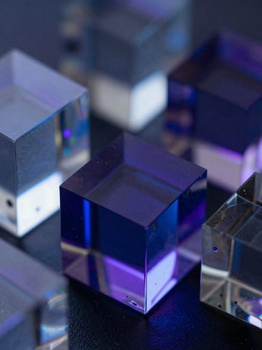 Macro close-up of translucent 3D glass geometries refracting deep blue and purple light, dark background, sharp focus on glass edges.