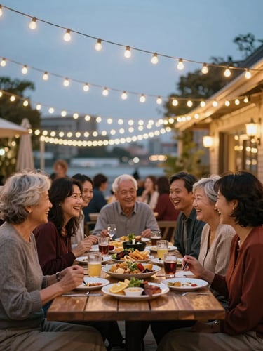 A warm environmental shot of a multi-generational family laughing and sharing food around a large outdoor table at DockYard, soft twilight, festive festoon lights glowing overhead, 35mm restaurant photography