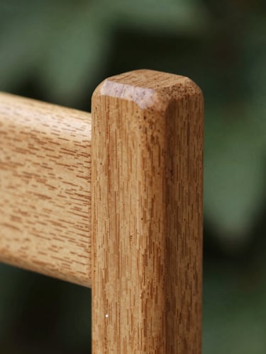 Extreme close-up of an immaculate finger joint in natural oak wood, soft diffused daylight, architectural precision, 35mm
