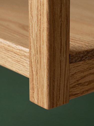 Close-up of immaculate wood joint, soft natural daylight, rich oak grain, contemporary architectural detail, shallow depth of field, 35mm