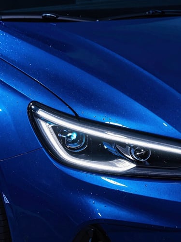 Sleek close-up of water beading on pristine glossy dark blue car paint, glowing electric neon blue backlighting, sharp reflections, 50mm