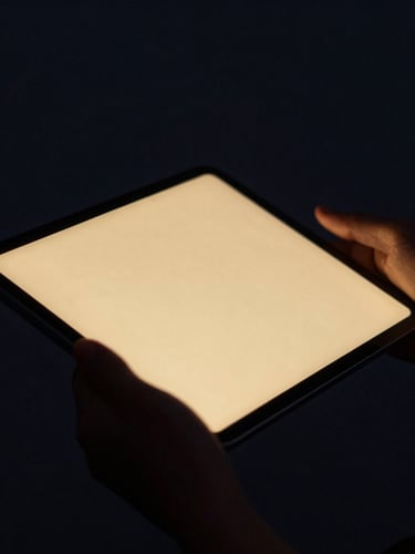 Close-up of hands holding a tablet in soft atmospheric lighting, glowing gold highlights on the screen, deep charcoal background, 35mm