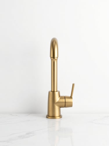 A clean, front-on architectural elevation of a brushed gold faucet on a pure white marble background, crisp shadows, minimalist composition