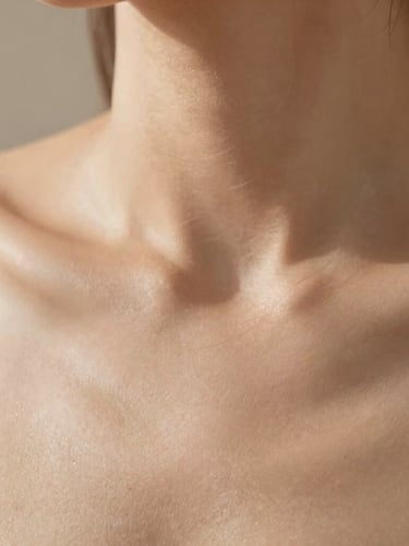 Close-up of clean skin texture and delicate hair movement in warm natural light, soft earth tones, shallow depth of field
