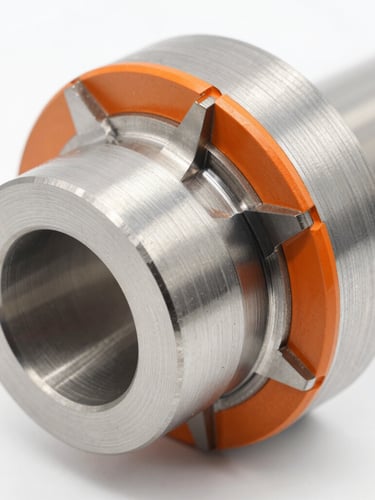 Bright high-key industrial photography, crisp studio light, sharp metallic reflections, close-up of a freshly machined aerospace component with visible tool paths, macro depth of field