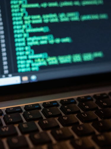 A macro close-up of a dark mechanical keyboard and a high-contrast terminal screen displaying active multi-agent execution logs with neon cyan code lines, shallow depth of field, moody ambient obsidian light.
