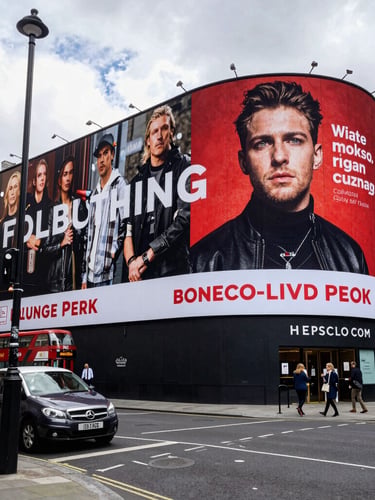 A high-contrast split composition showing a massive highway billboard frame on the left, and a smartphone screen displaying a bold social media advertisement on the right, bright daylight.