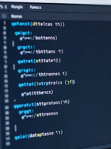 Macro close-up of clean database schema SQL code on a dark high-resolution monitor, cool blue and slate tones, sharp focus