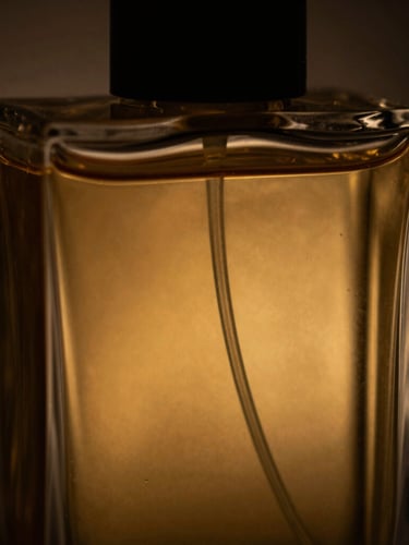 Extreme close-up of a heavy glass perfume bottle reflecting warm golden light, dark shadows, moody editorial photography, shallow depth of field, luxury aesthetic.