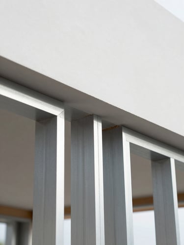 Macro detail shot of flawless finishing, neat architectural lines, crisp modern drywall framing, clean slate and steel tones, sharp focus