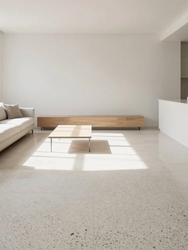 Crisp architectural shot of a bright modern living room with terrazzo floors and minimalist furniture, sunlit high-key daylight, soft shadows, pristine order.