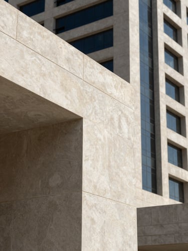 Architectural detail of Muscat business district, sharp concrete angles, bright sunlight, high contrast.