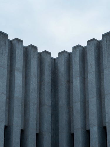 Macro close-up of sharp architectural lines of a modern courthouse facade, cool overcast morning light, muted blue shadows, highly symmetrical composition.
