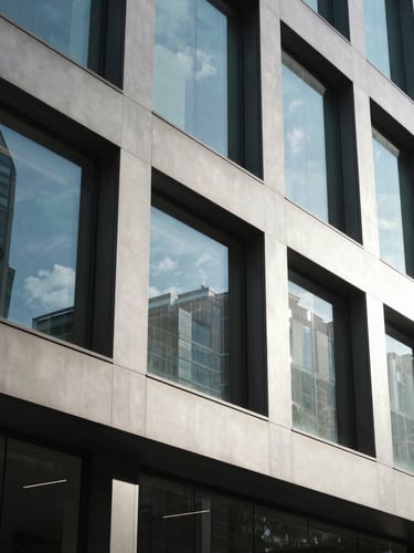 Bright, natural daylight illuminating a modern Sydney corporate office window with clean architectural lines, cool-toned and professional.