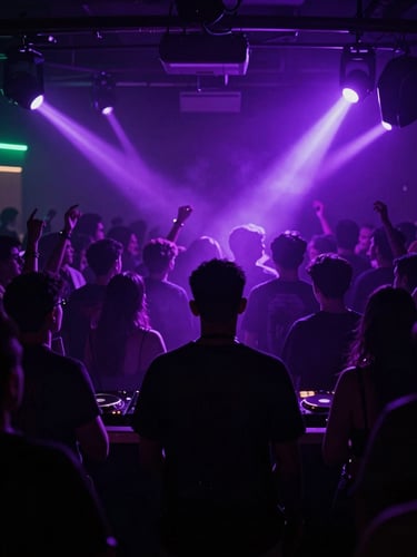 DJ Wick4u in high-contrast silhouette against a pulsing violet crowd, strobe lights cutting through smoke, wide-angle lens.