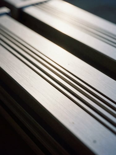Extreme macro photograph of advanced solid-state energy cells, clean metallic lines, high contrast, dramatic natural overcast light.