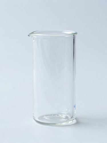 Macro shot of sterile laboratory glass under cold-toned clinical light, sharp focus, clean blue-gray background
