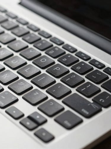 Macro shot of an open premium laptop keyboard and metallic chassis under cool studio lighting, focusing on the precision of the keys.