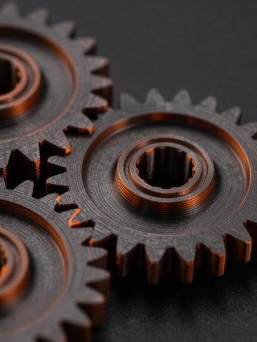 Macro close-up of 3D printed mechanical gears with perfect orange layer lines, dark obsidian background, dramatic low-key lighting.