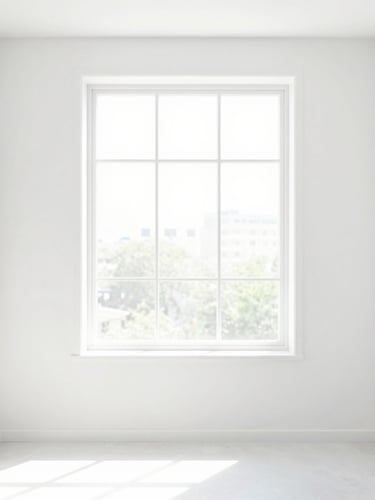 Bright high-key interior photography of a clean modern living room, natural morning window light, crisp clean white walls, 35mm
