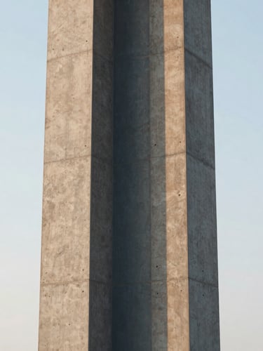 Close-up texture of a modern concrete and steel structural column, soft late-afternoon sun, linear perspective, medium format