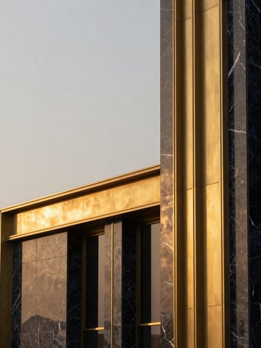 Minimalist close-up of premium marble and brass architectural details in a Dubai penthouse, soft golden hour light, high-contrast luxury.
