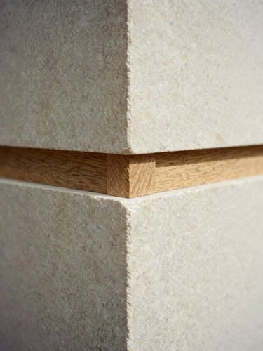 Extreme close-up of a perfectly aligned timber joint, raw oak meeting honed limestone, natural directional daylight, sharp focus on materiality