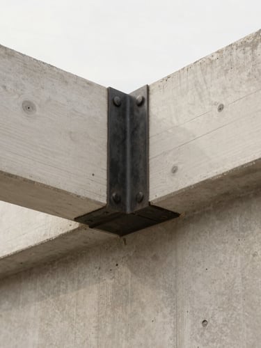 Extreme close-up of an architectural joint where a structural white oak beam meets a raw concrete wall. Blackened steel hardware is visible. Sharp details, soft diffused daylight.