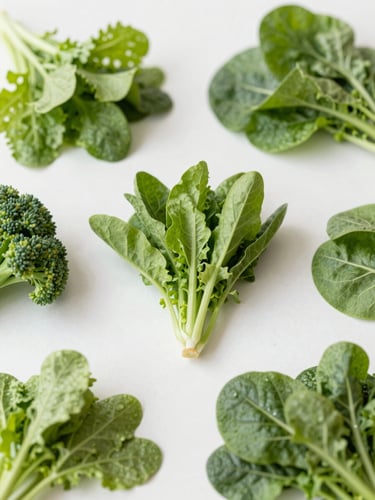 Overhead flat-lay of vibrant fresh vegetables, bright natural daylight, crisp botanical greens, minimalist composition, shallow depth of field